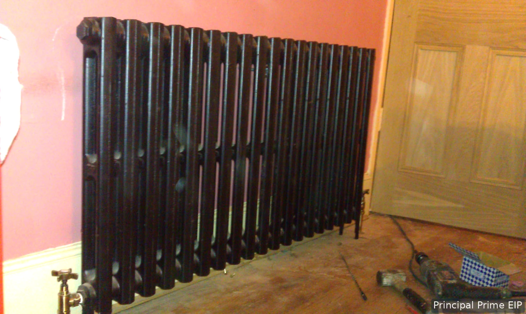 Column radiator fitted during interior refurbishment Column radiator fitted during interior refurbishment