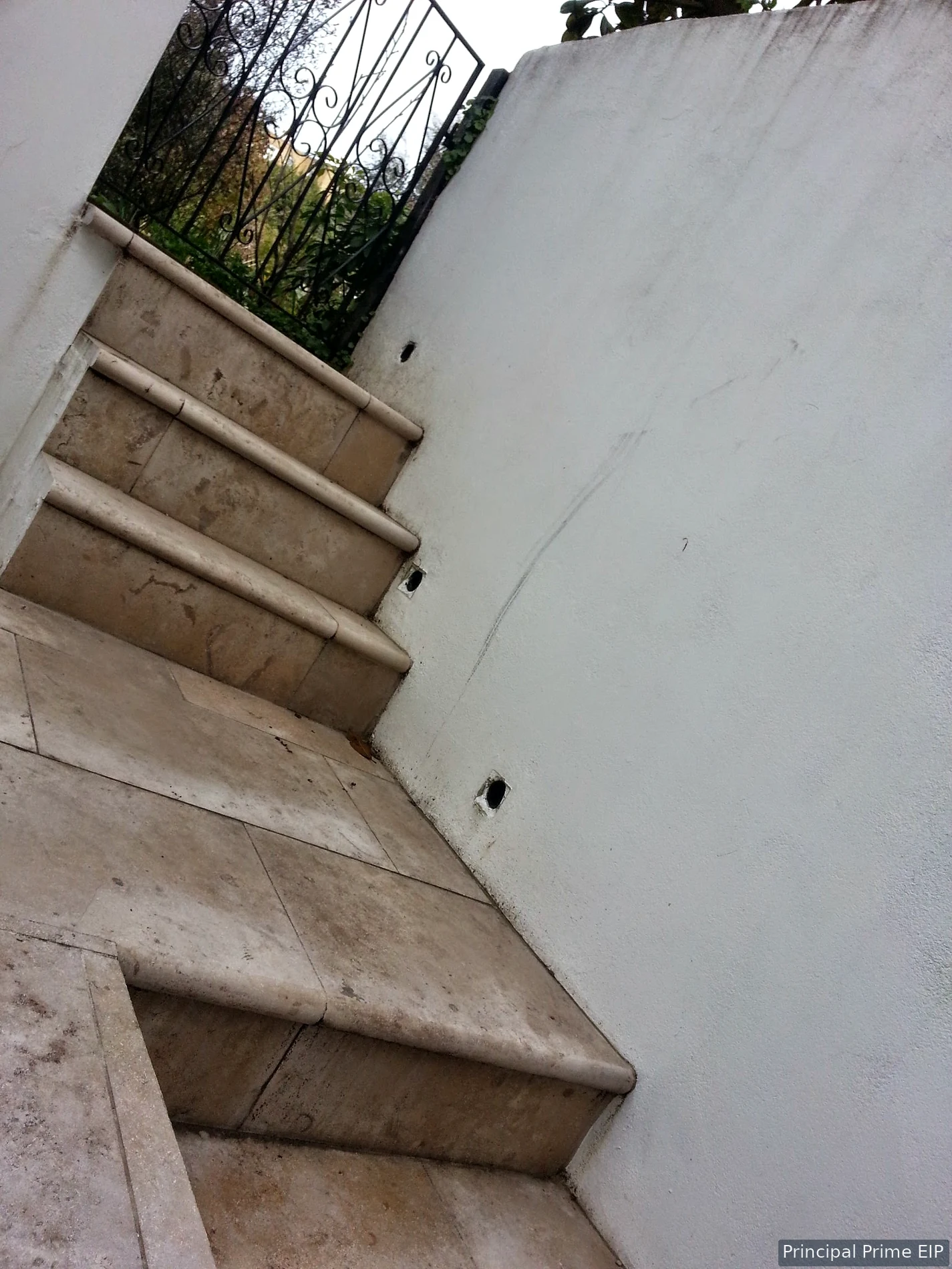 Finished external stone steps and rendered walls Finished external stone steps and rendered walls