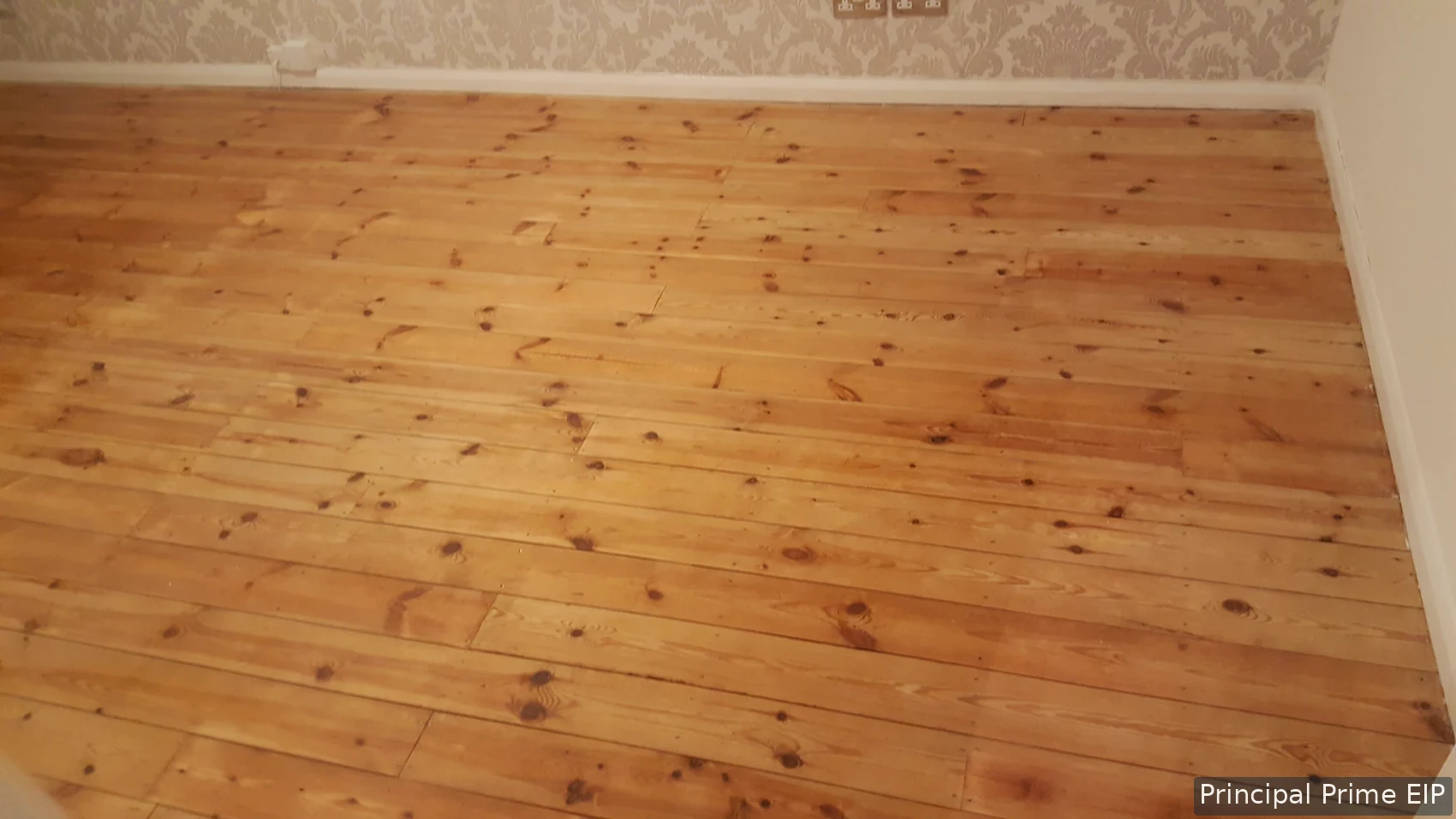 Restored timber floorboards with a natural finish Restored timber floorboards with a natural finish