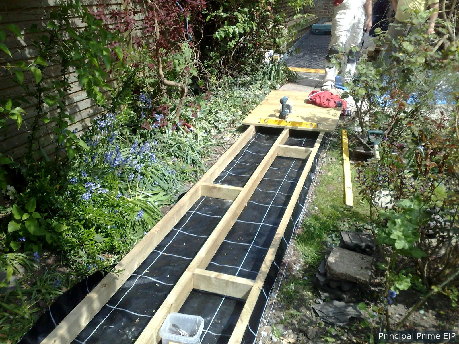 Timber support structure for a garden walkway Timber support structure for a garden walkway