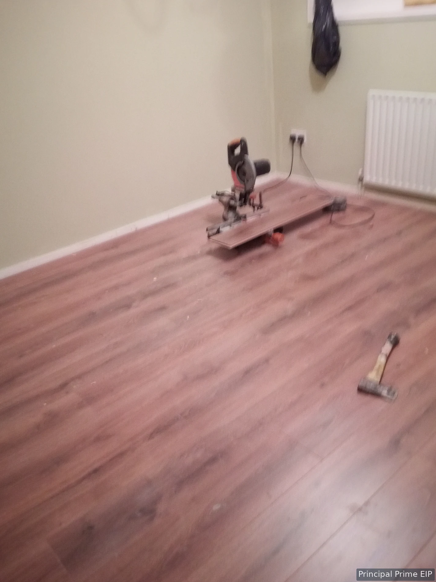 Timber flooring installation with fitting tools Timber flooring installation with fitting tools.