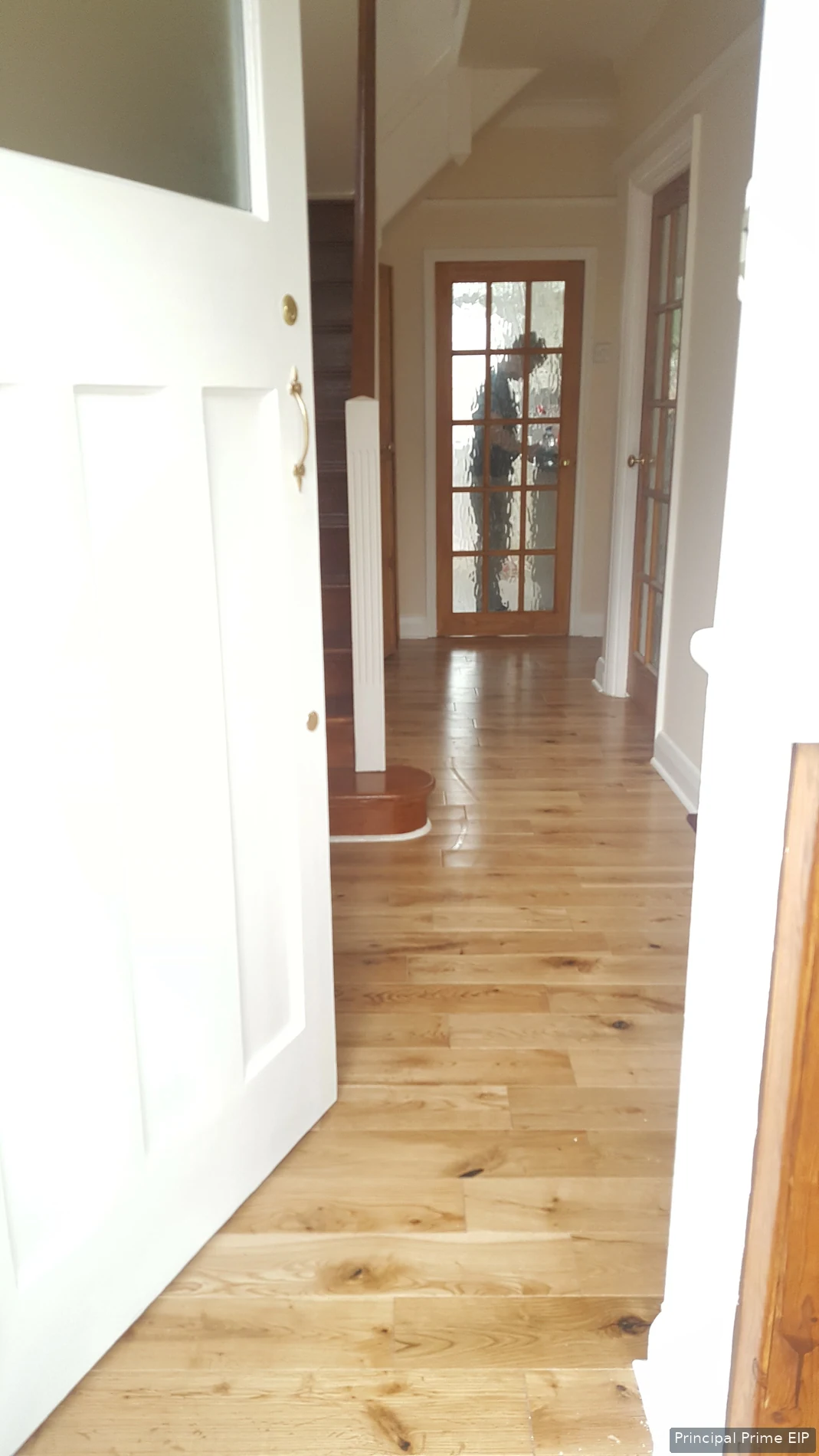 Timber hallway flooring leading to the finished staircase Timber hallway flooring leading to the finished staircase in Merton (SM4).